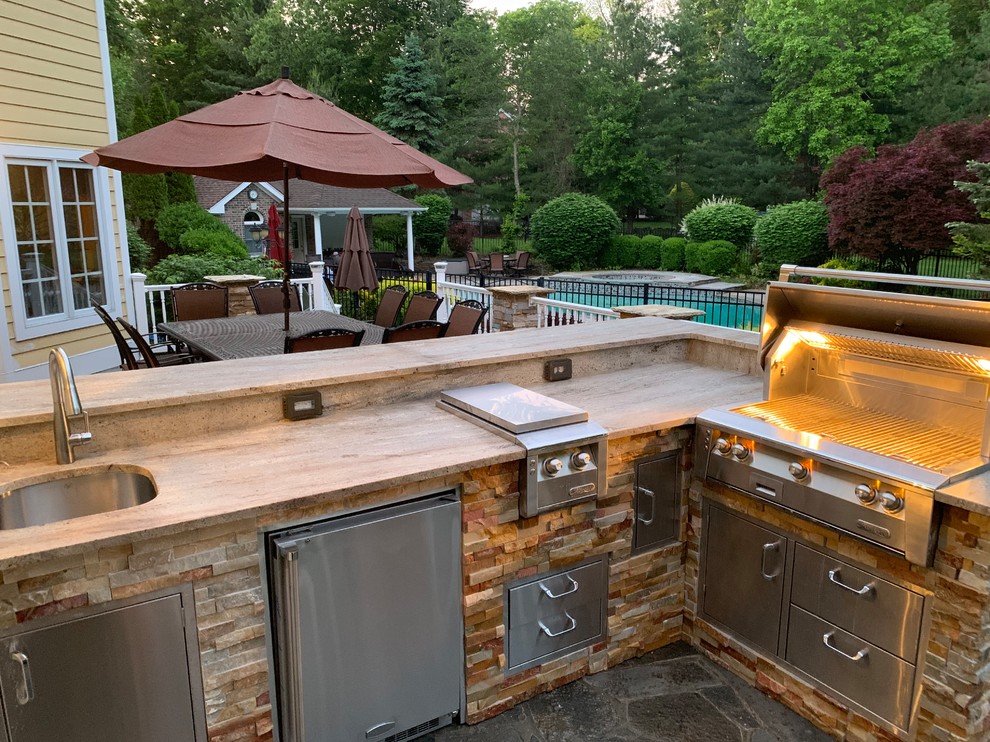 Traditional Outdoor Kitchen completing an Amazing Backyard ...