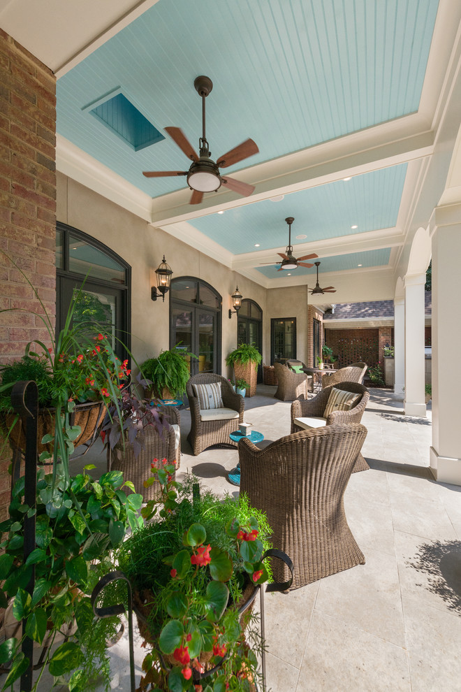 Patio - traditional patio idea in Charlotte with a roof extension