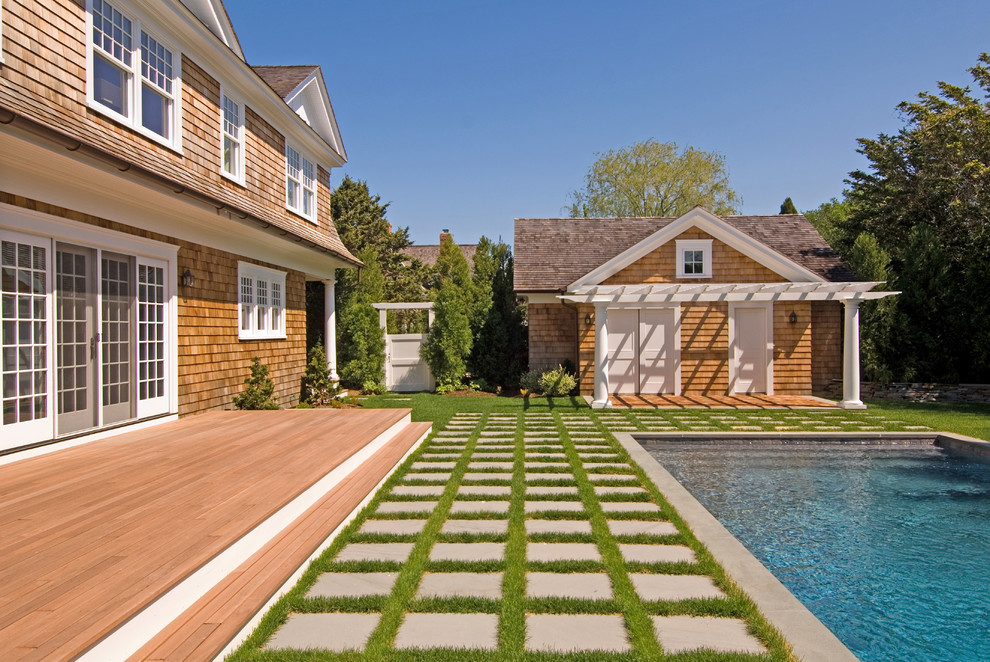 Inspiration for a timeless patio remodel in New York with decking