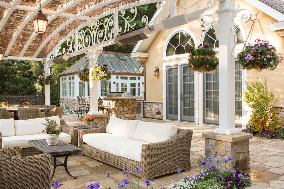 Inspiration for a timeless patio remodel in Other with a pergola