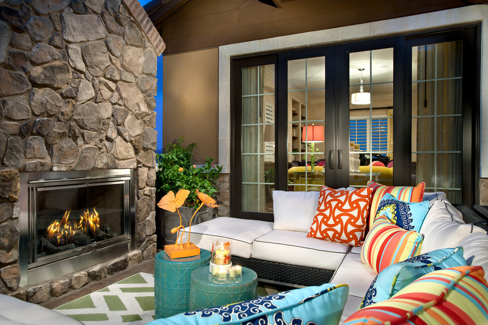 Design ideas for a classic patio in Denver with a fire feature.