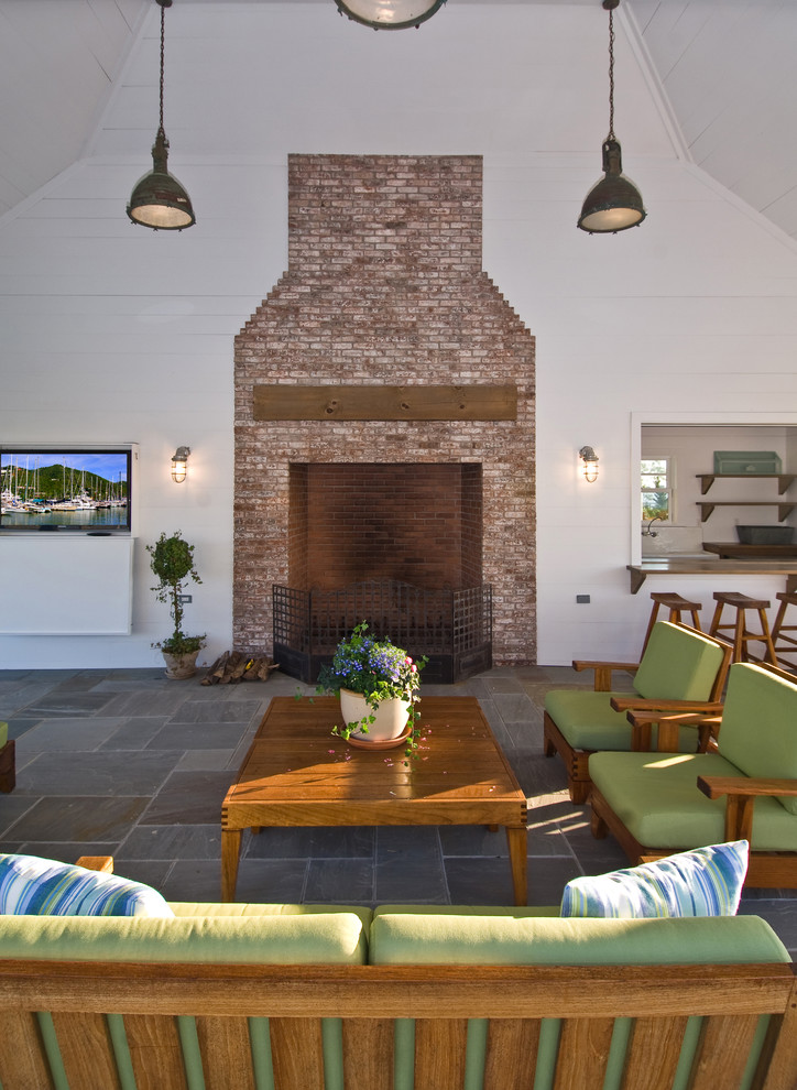 This is an example of a classic patio in New York with a fire feature.