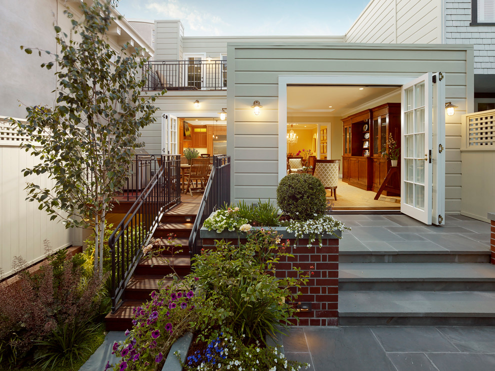 This is an example of a classic back patio steps in San Francisco with natural stone paving.