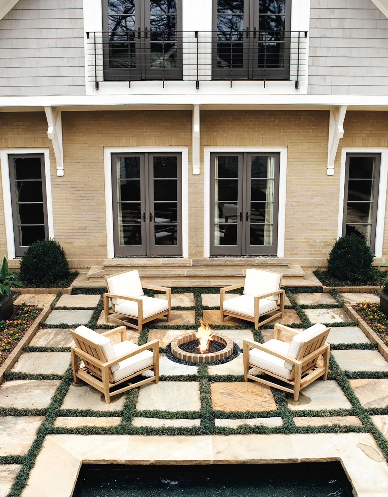 Traditional patio in Atlanta with a fire feature.