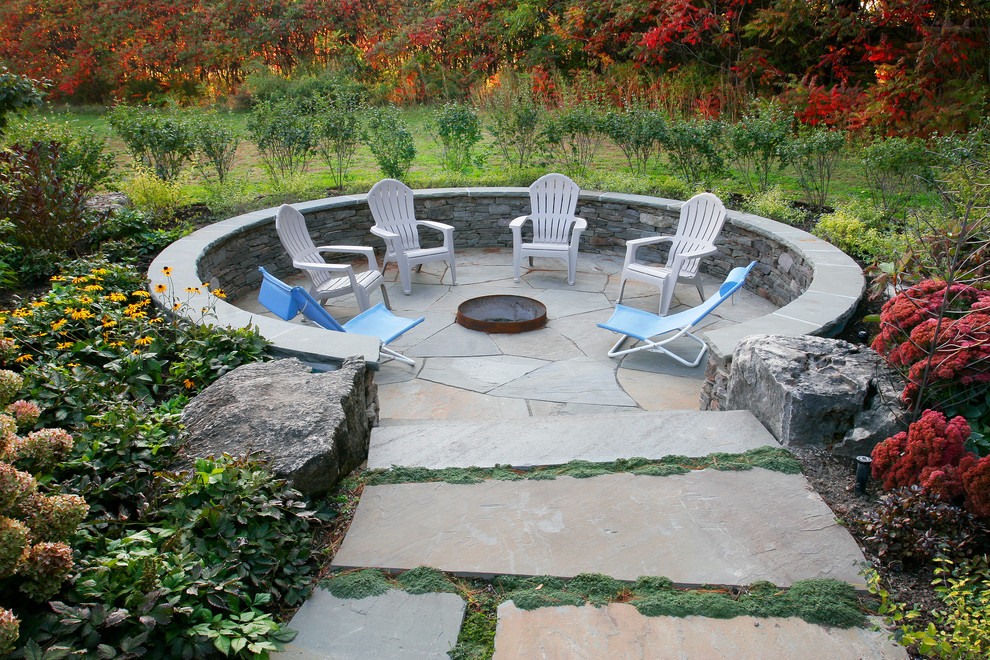Inspiration for a classic patio in Burlington with a fire feature.