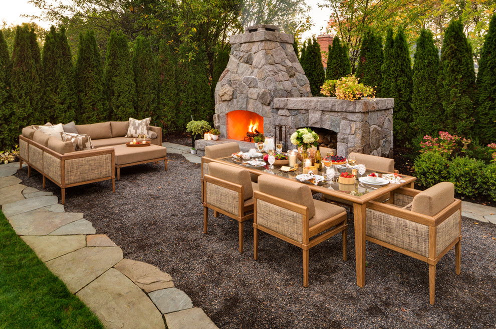 Inspiration for a traditional patio in Portland with a fire feature and gravel.