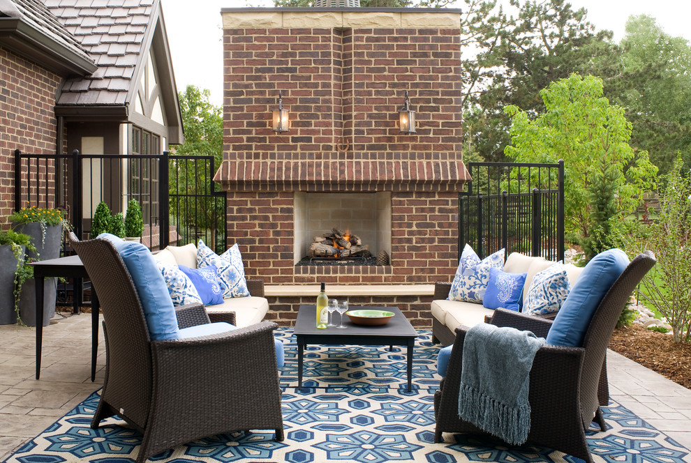 Inspiration for a classic patio in Denver with a fire feature.