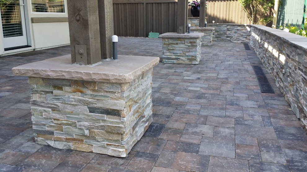 Travertine and Paver Patio with Veneer Stone Walls Traditional Patio San Francisco by