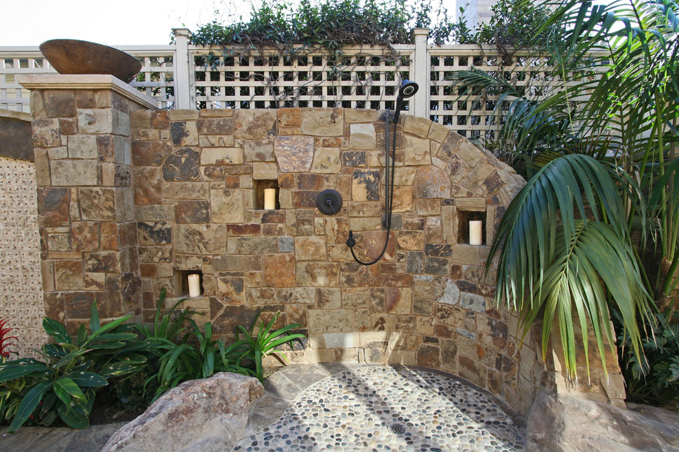 Inspiration for a tropical backyard outdoor patio shower remodel in San Diego