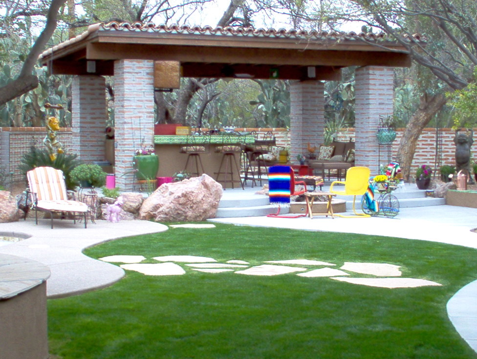 Design ideas for a medium sized classic back patio in Phoenix with concrete paving and no cover.