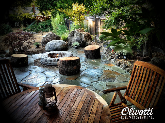 tumbled cobblestone patio, cobblestone fire pit Traditional Patio