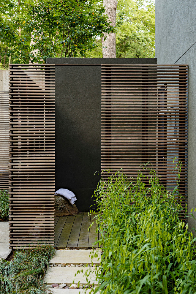 Example of a trendy outdoor patio shower design in DC Metro