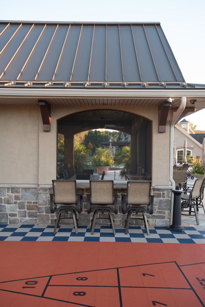 Inspiration for a huge timeless patio remodel in Other