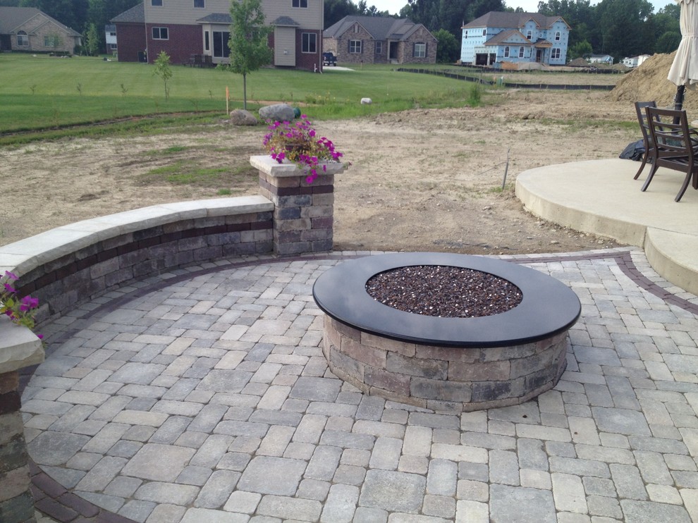 Unilock Dimensional Seat Wall, Fire PIt & Pillars w/ a Unilock Brussels