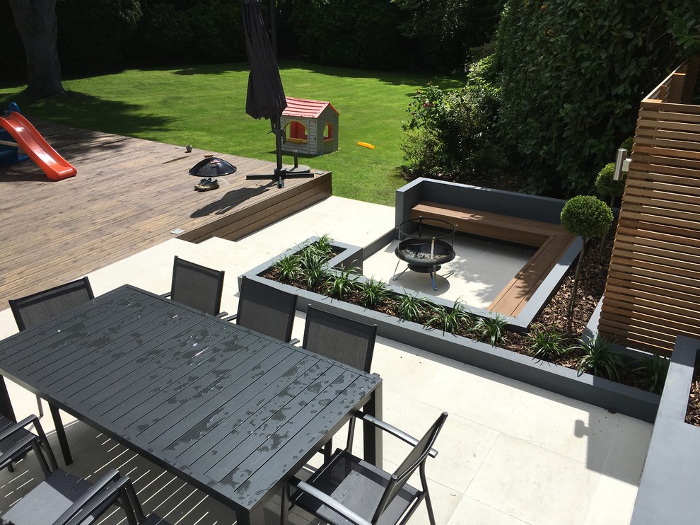 This is an example of a contemporary patio in Hampshire.