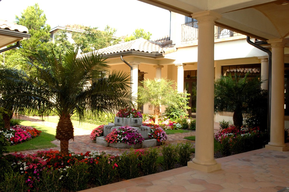 Example of a tuscan patio design in Orlando