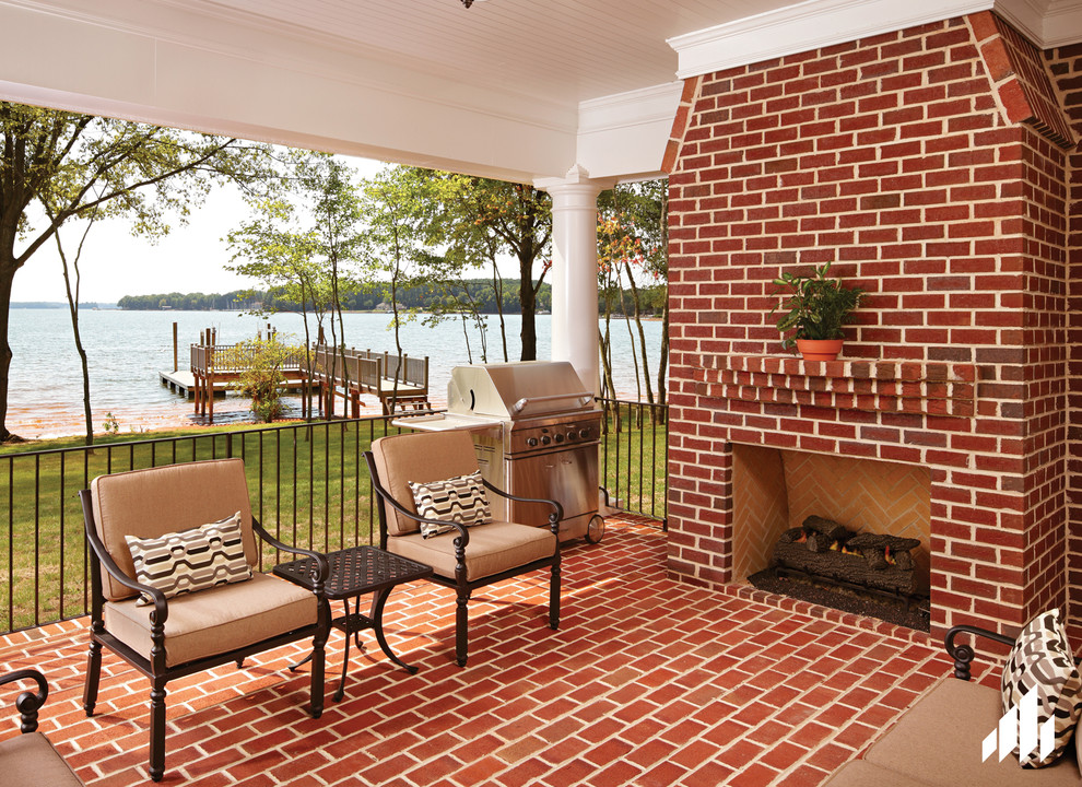 Inspiration for a timeless brick patio remodel in Other