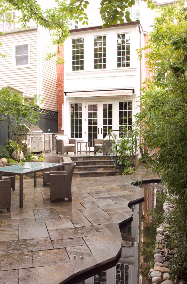 Design ideas for a traditional patio in DC Metro with a bbq area.
