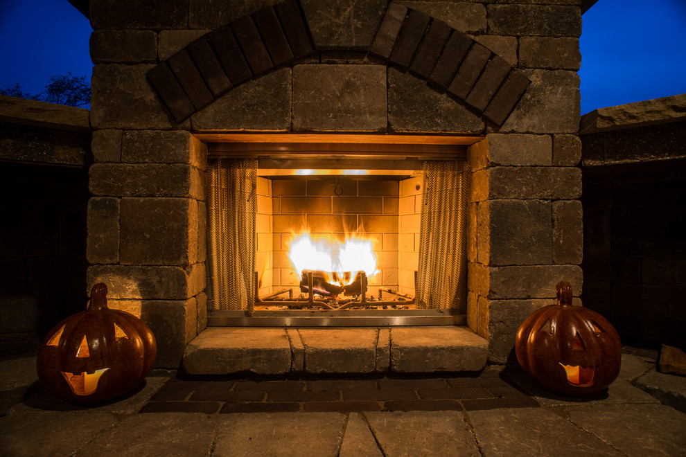 Warming Outdoor Fireplace & Fire Pit Retreats Traditional Patio