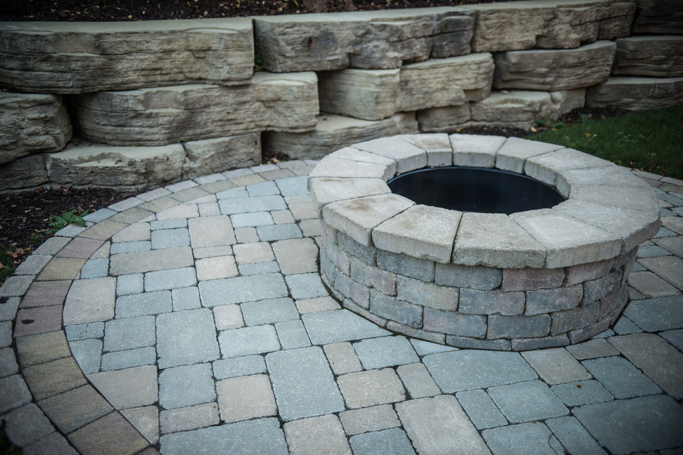 Warming Outdoor Fireplace & Fire Pit Retreats Traditional Patio