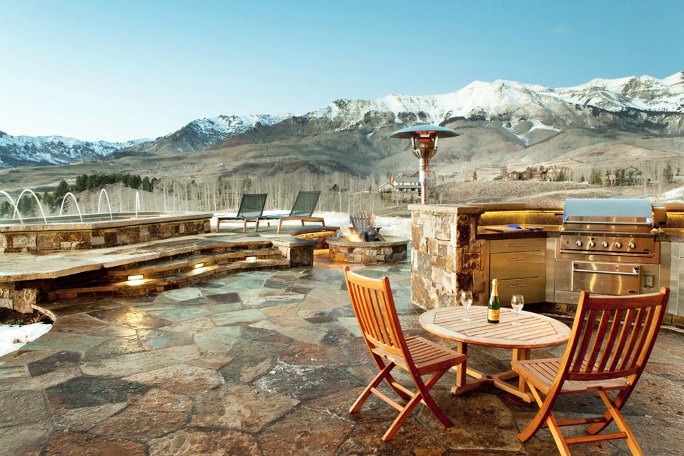 This is an example of a rustic patio in Denver.