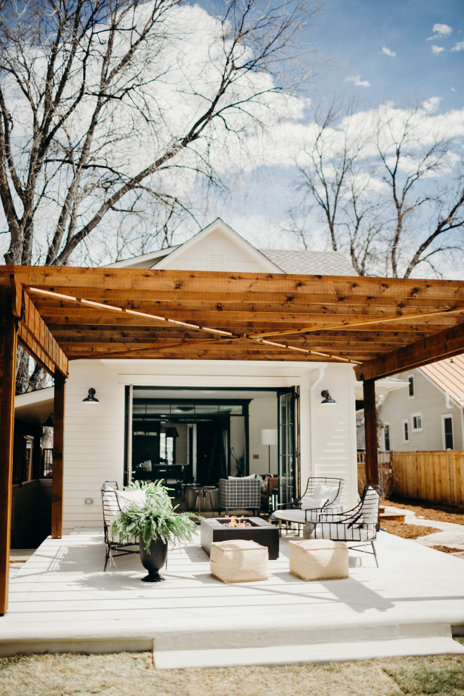 Farmhouse patio photo in Denver