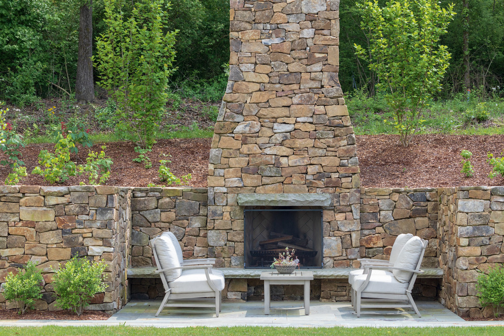 Design ideas for a classic patio in Other with a fireplace and no cover.