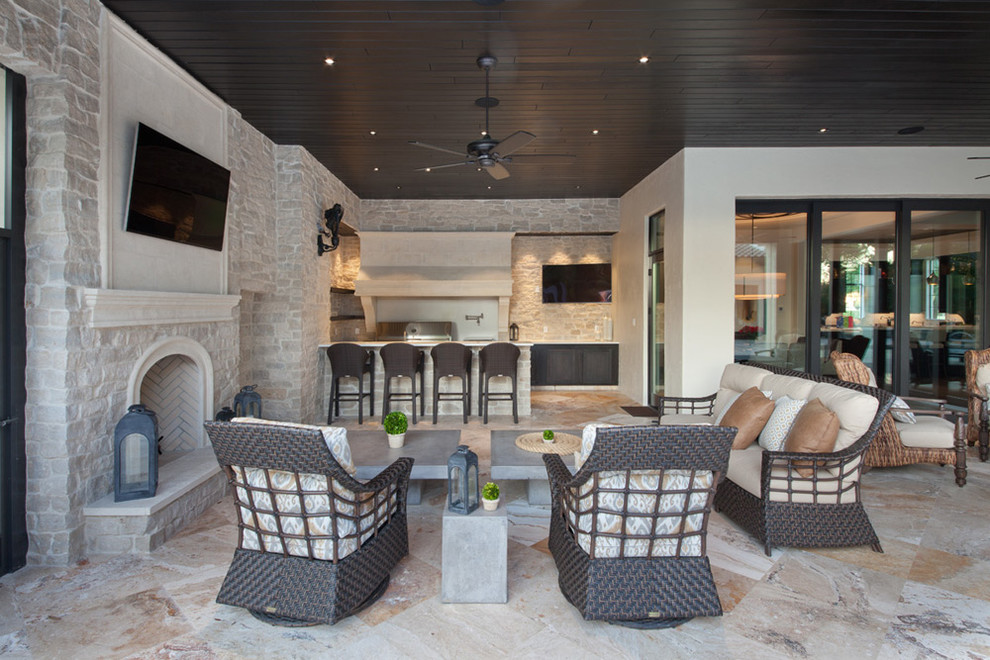 Inspiration for an expansive rustic back patio in Orlando with an outdoor kitchen, tiled flooring and a roof extension.