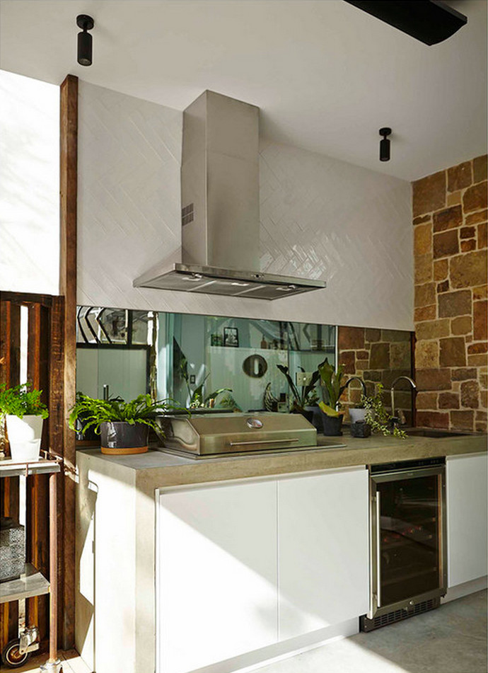 This is an example of a contemporary patio in Sydney with an outdoor kitchen.