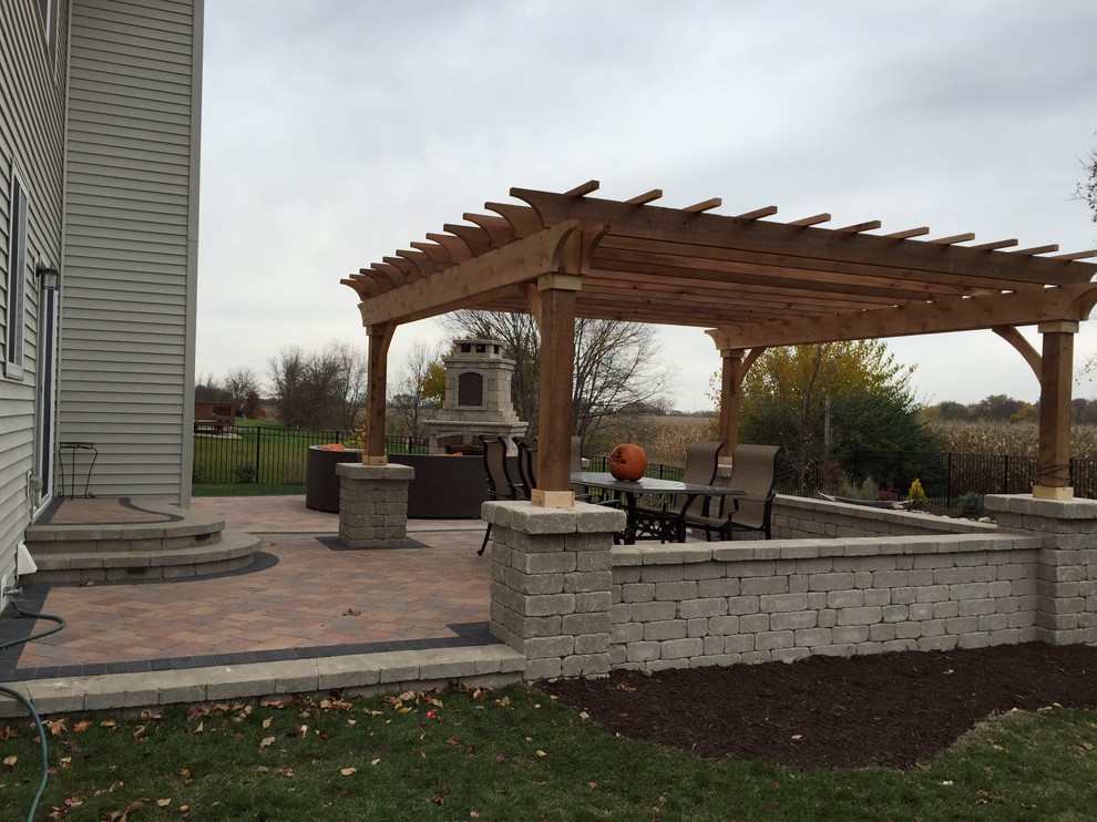 Yorkville Outdoor Living Area with Pergola & Fireplace Traditional