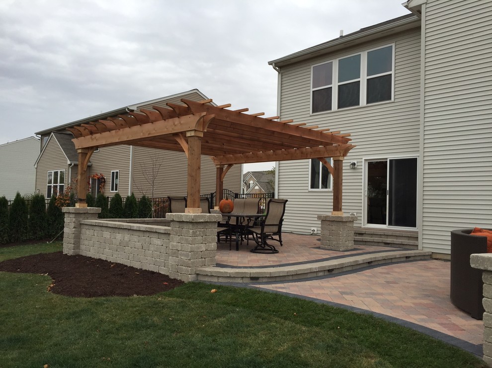 Yorkville Outdoor Living Area with Pergola & Fireplace Traditional