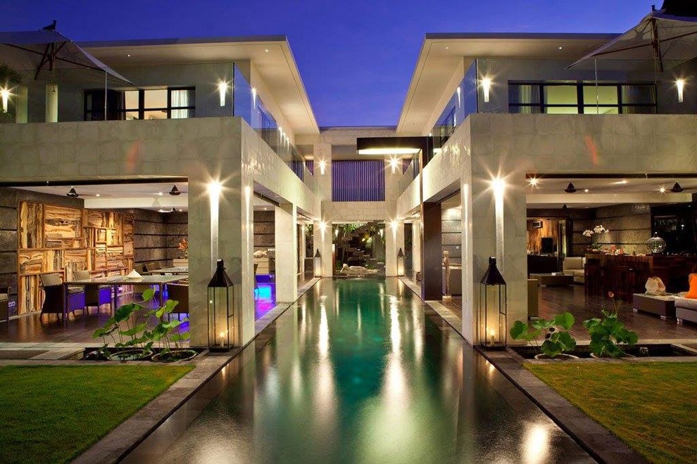 Ejemplo de casa de la piscina y piscina alargada contemporánea de tamaño medio rectangular en patio