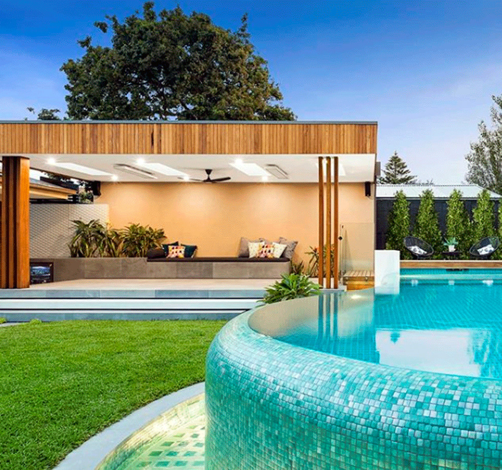 Photo of a medium sized modern front custom shaped above ground swimming pool in Melbourne with a pool house.