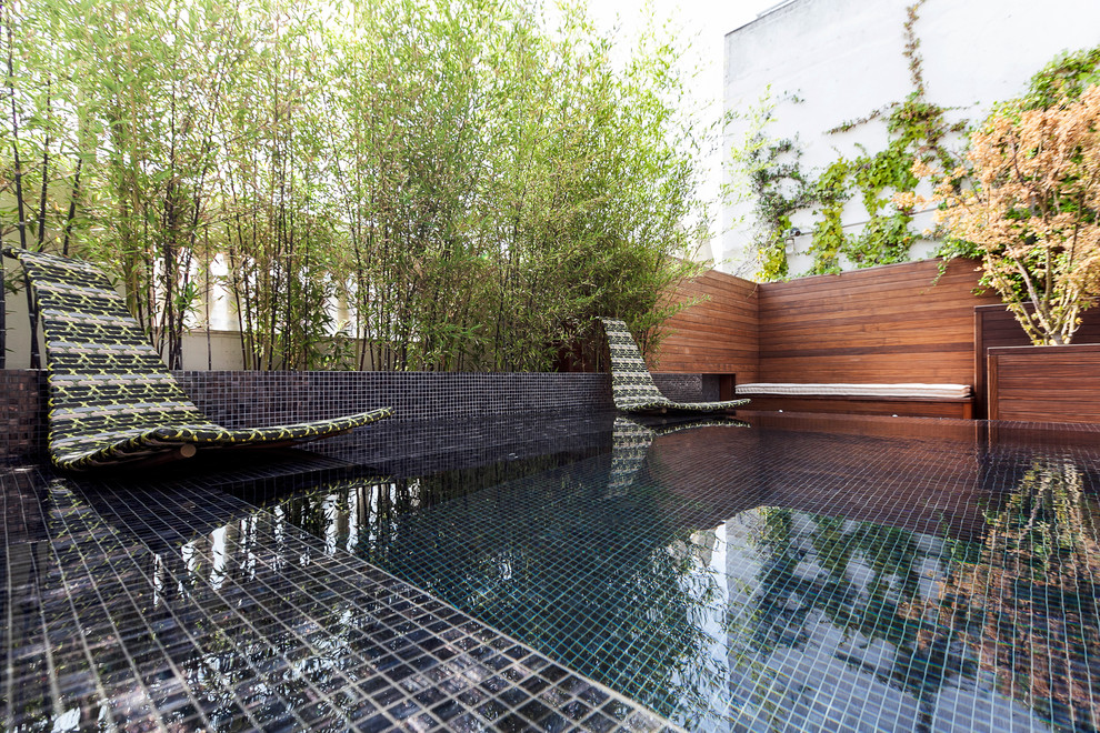 Design ideas for a small contemporary swimming pool in Madrid.