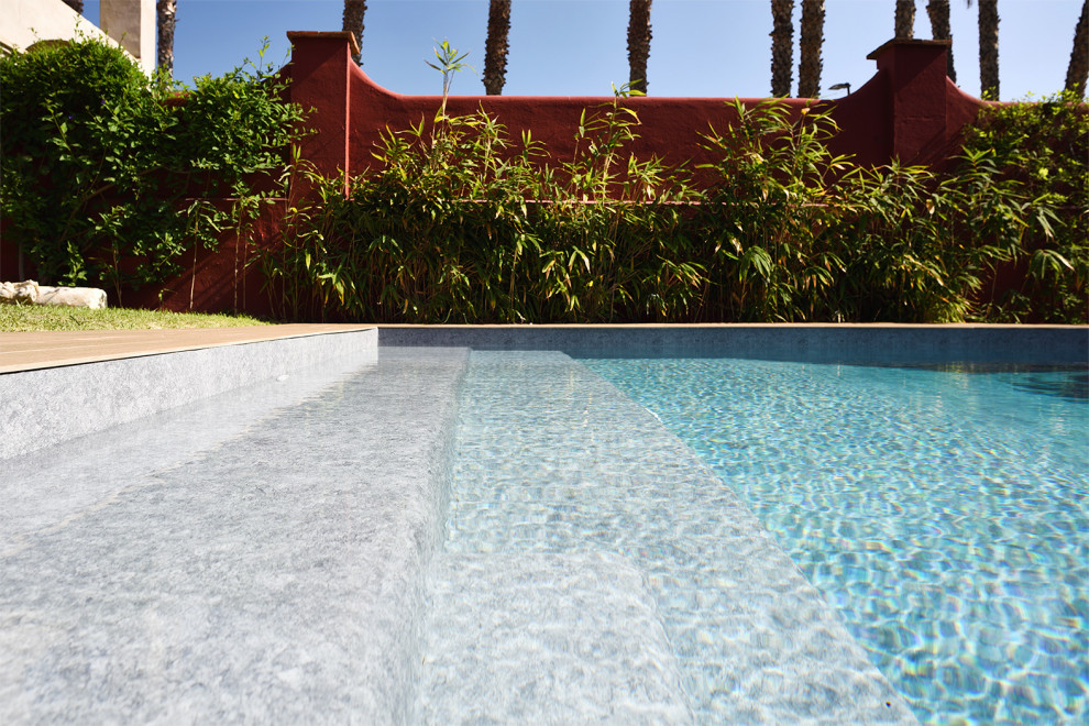 Photo of a modern rectangular lengths swimming pool in Malaga.
