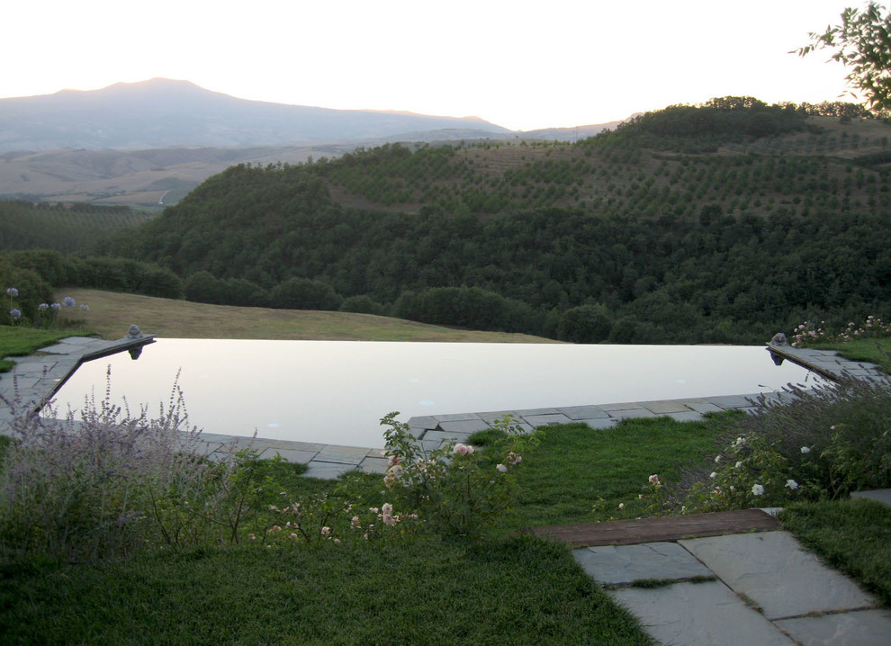 Ispirazione per una piscina country