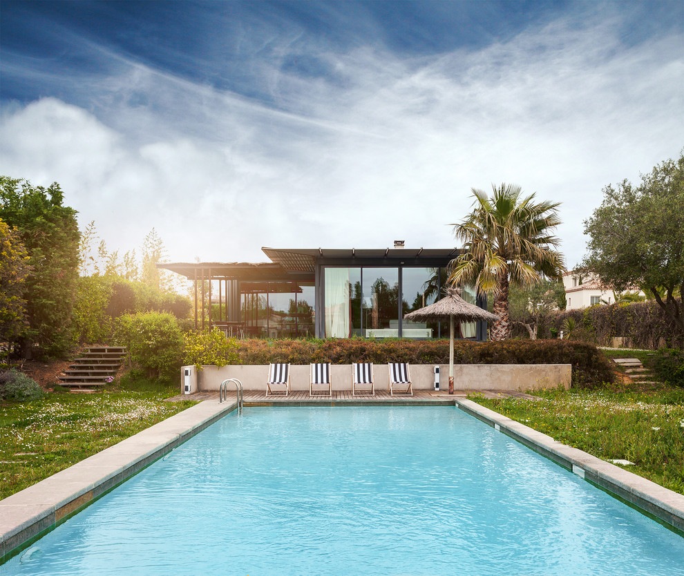 Large world-inspired rectangular swimming pool in Montpellier.