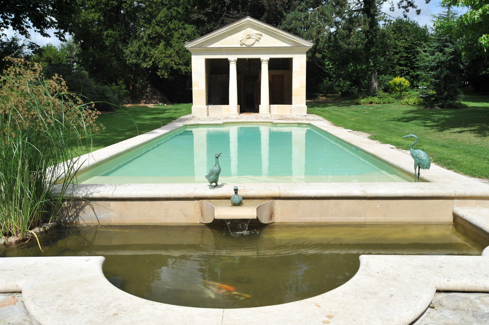 Cette photo montre un Abris de piscine et pool houses chic de taille moyenne et rectangle.