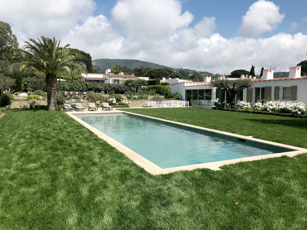 Pool - large contemporary rectangular lap pool idea in Marseille
