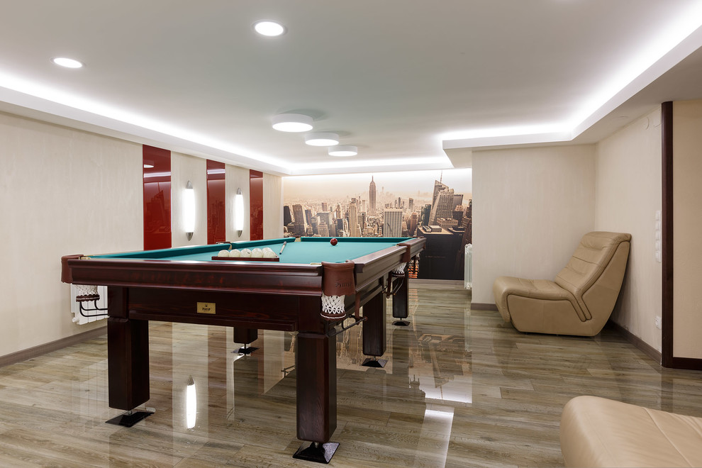 Large contemporary games room in Saint Petersburg with no fireplace, beige walls, porcelain flooring and grey floors.