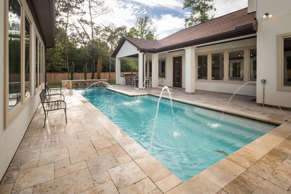 Tuscan pool photo in Houston