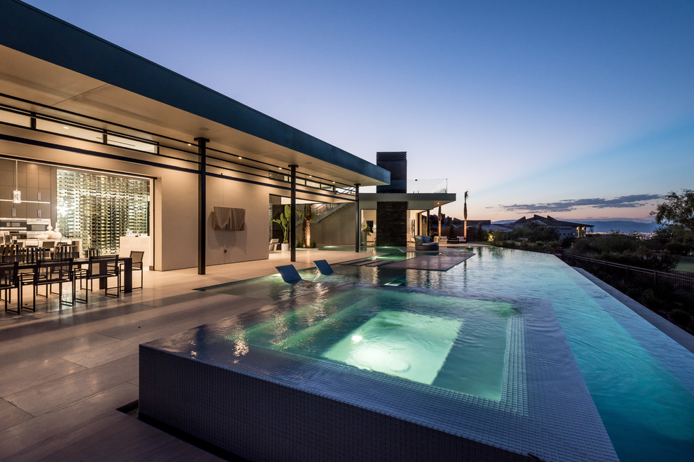 Geräumiger Moderner Pool hinter dem Haus in individueller Form mit Betonboden in Las Vegas