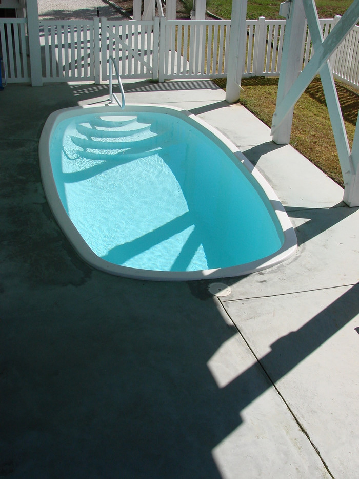 Example of an island style pool design in Wilmington