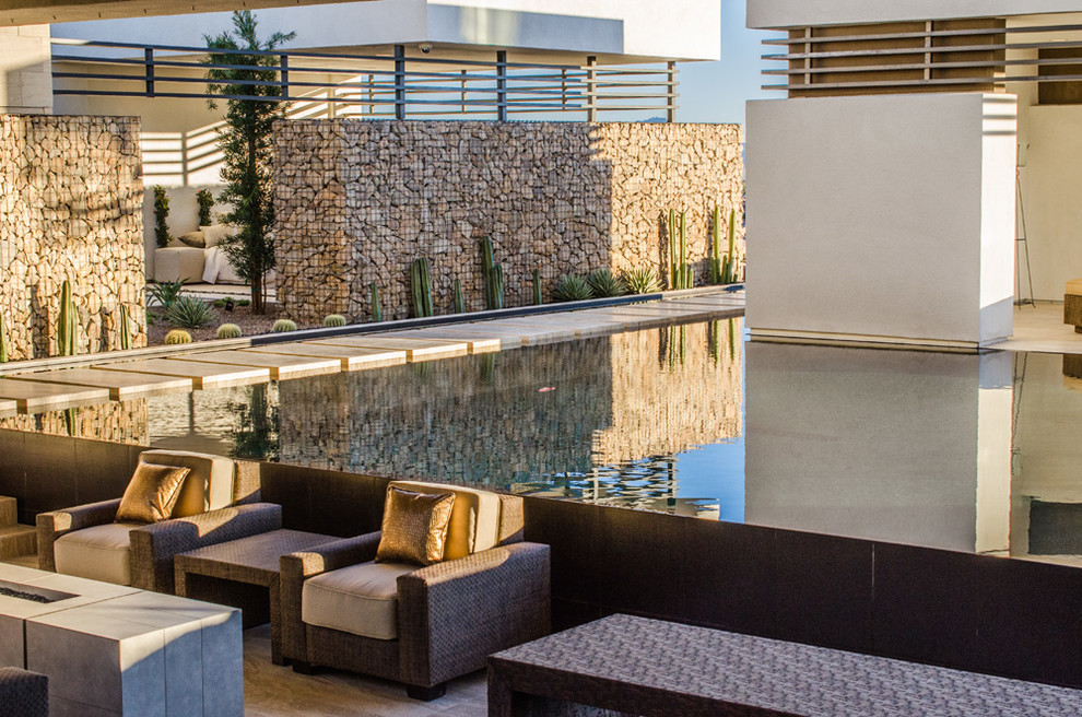 Design ideas for a contemporary rectangular swimming pool in Las Vegas.