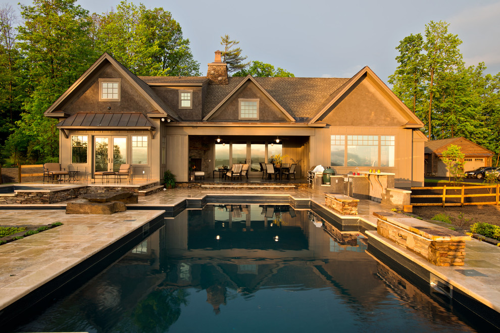 Inspiration for a rustic pool remodel in New York