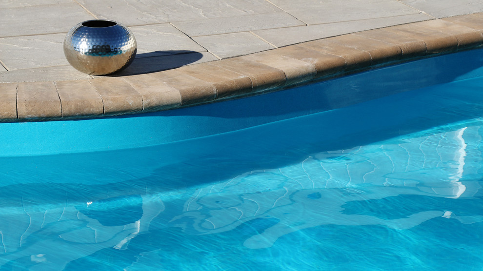 A 40 foot Fiberglass Pool in a Small Yard - Beach Style - Pool - New