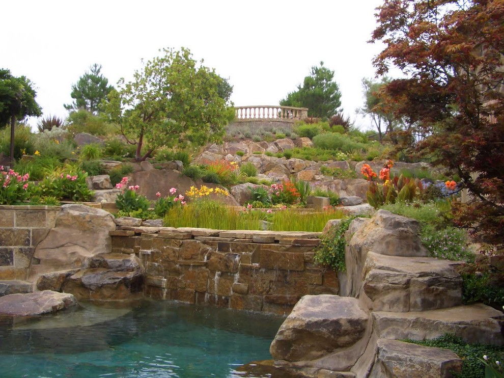 Pool - large mediterranean backyard stone and custom-shaped natural pool idea in San Francisco