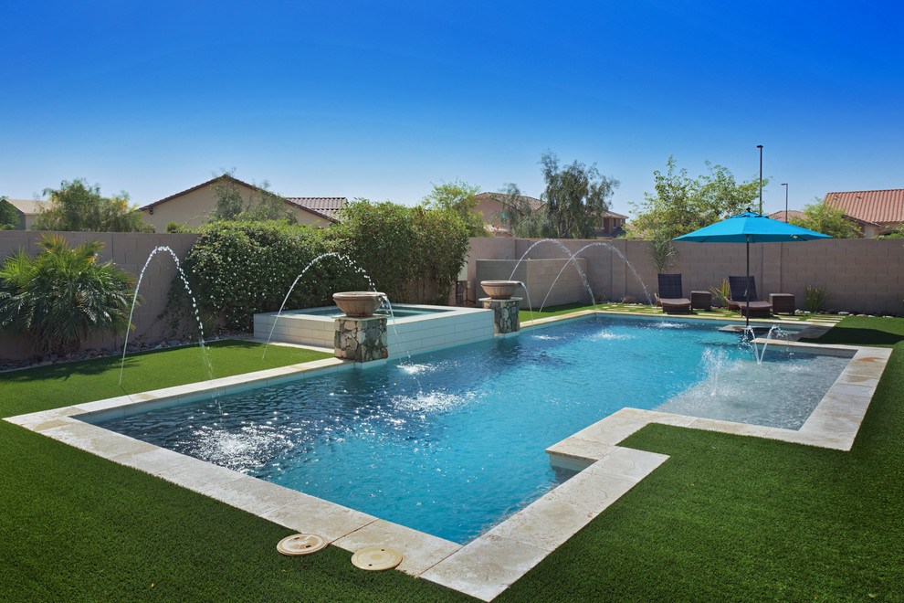 Diseño de piscinas y jacuzzis contemporáneos grandes rectangulares en patio trasero