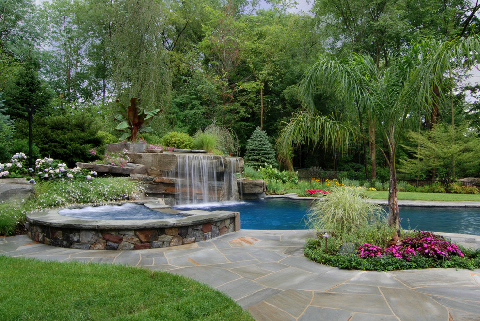 Inspiration for a tropical pool remodel in New York