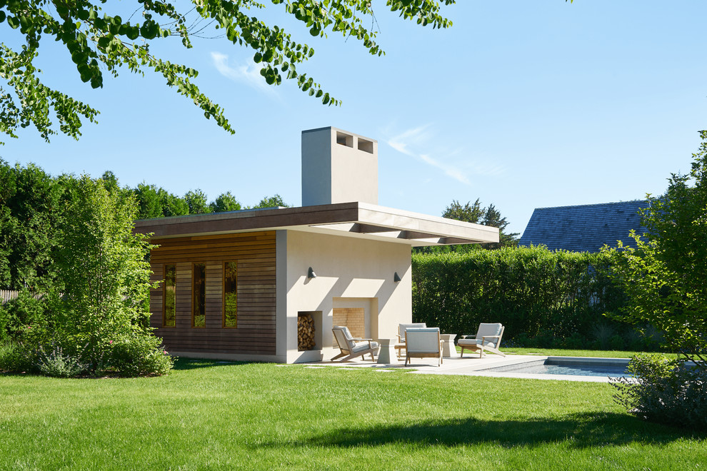 Diseño de casa de la piscina y piscina marinera rectangular en patio trasero